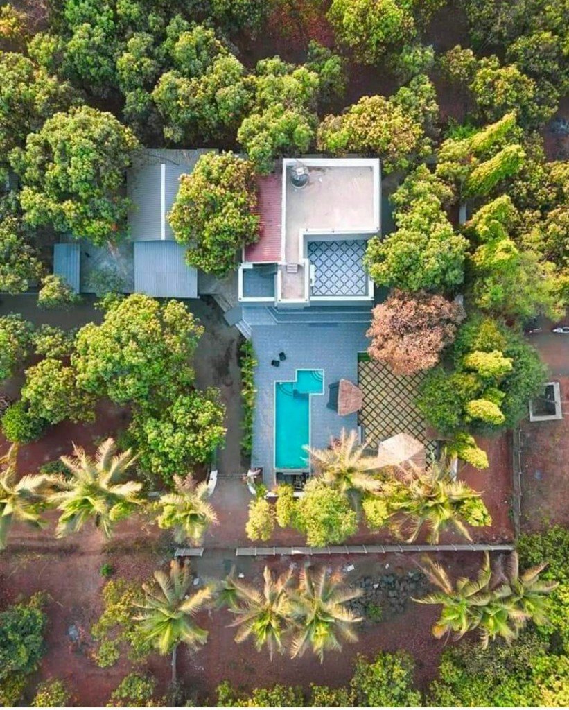 Aerial view of Ariyo Villa nestled in green surroundings