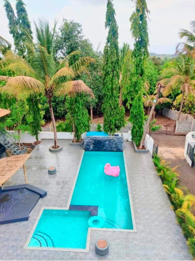 Ariyo Villa private pool with tropical surroundings